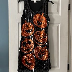Spirit Halloween pumpkin dress. Size large but fits medium